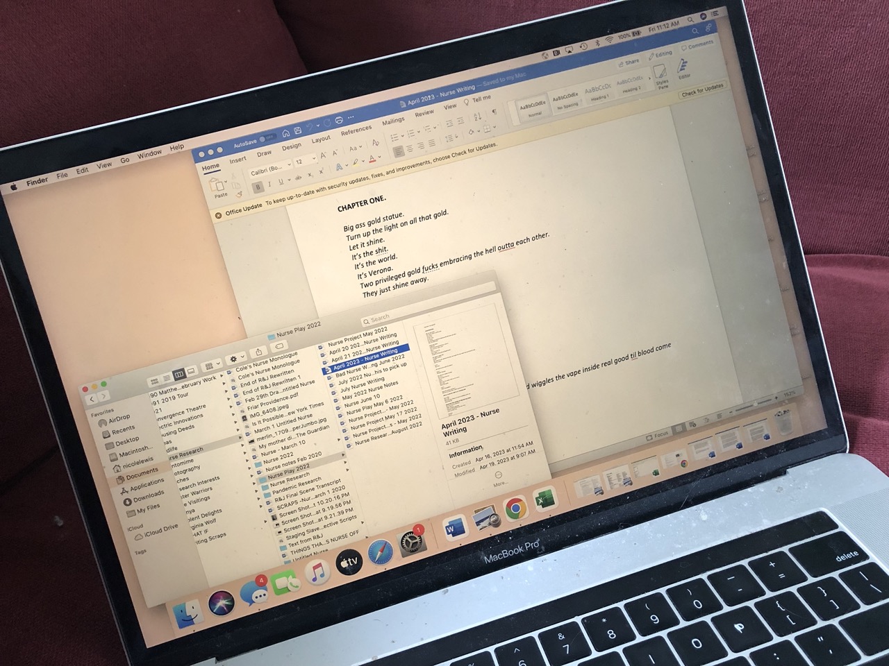 computer screen with multiple files and tabs open 